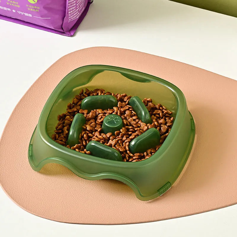 Blue slow feeder dog bowl with internal ridges to prevent fast eating and choking.