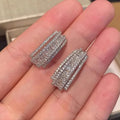 Geometric copper stud earrings with zircon inlaid design in white gold colour finish