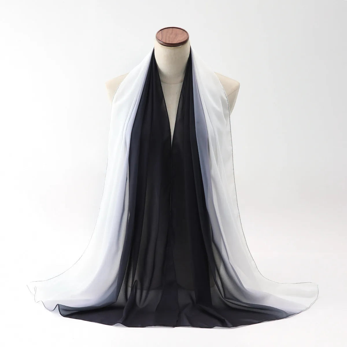 Long lightweight chiffon summer scarf for women draped to show its 175cm length and soft fabric.