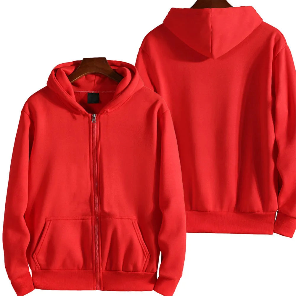 Man wearing a solid colour loose fit full-zip sports jacket.