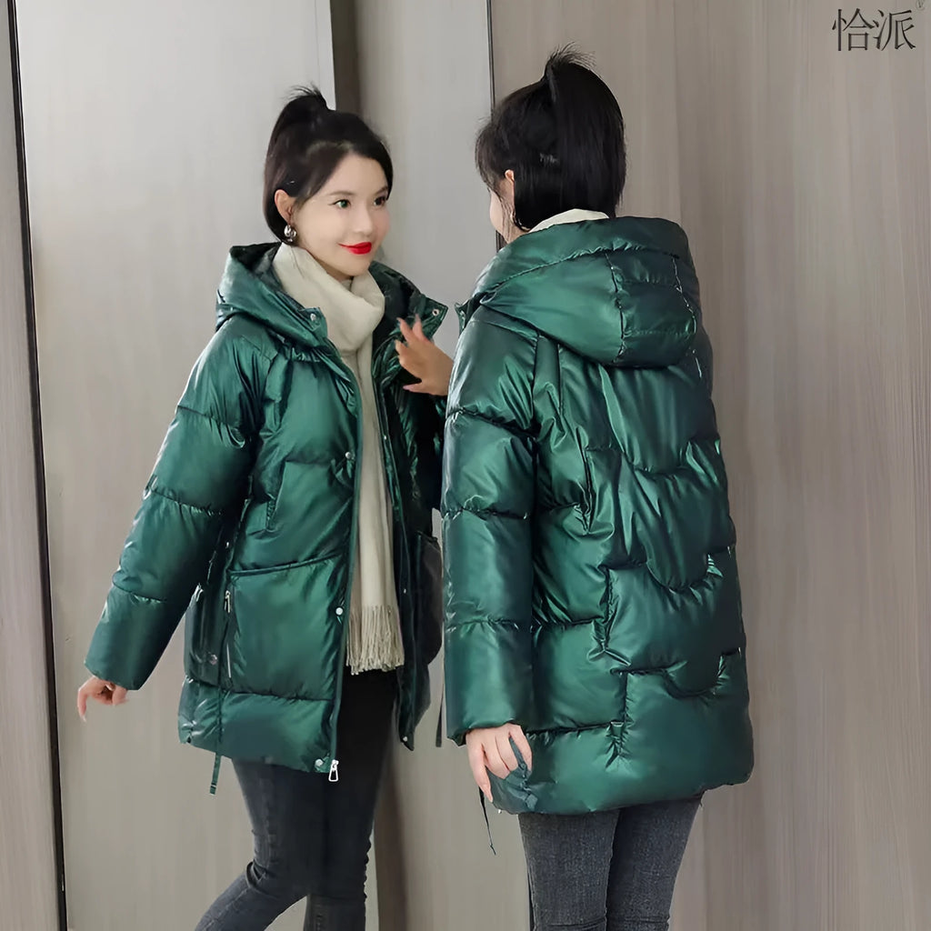 Women's loose fit thick hooded down cotton jacket in black, shown with long sleeves and a front zip.