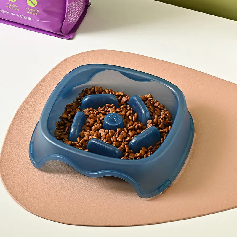 Blue slow feeder dog bowl with internal ridges to prevent fast eating and choking.