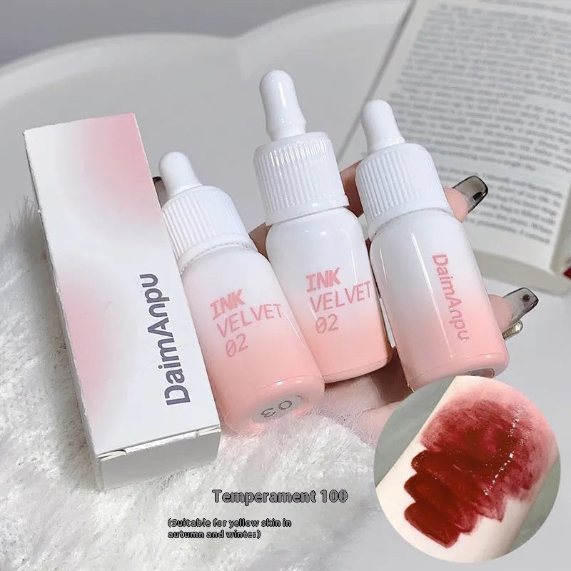 Mirror Lip Lacquer tube in 3.5g size showing four shade options from Milk Huhoo series