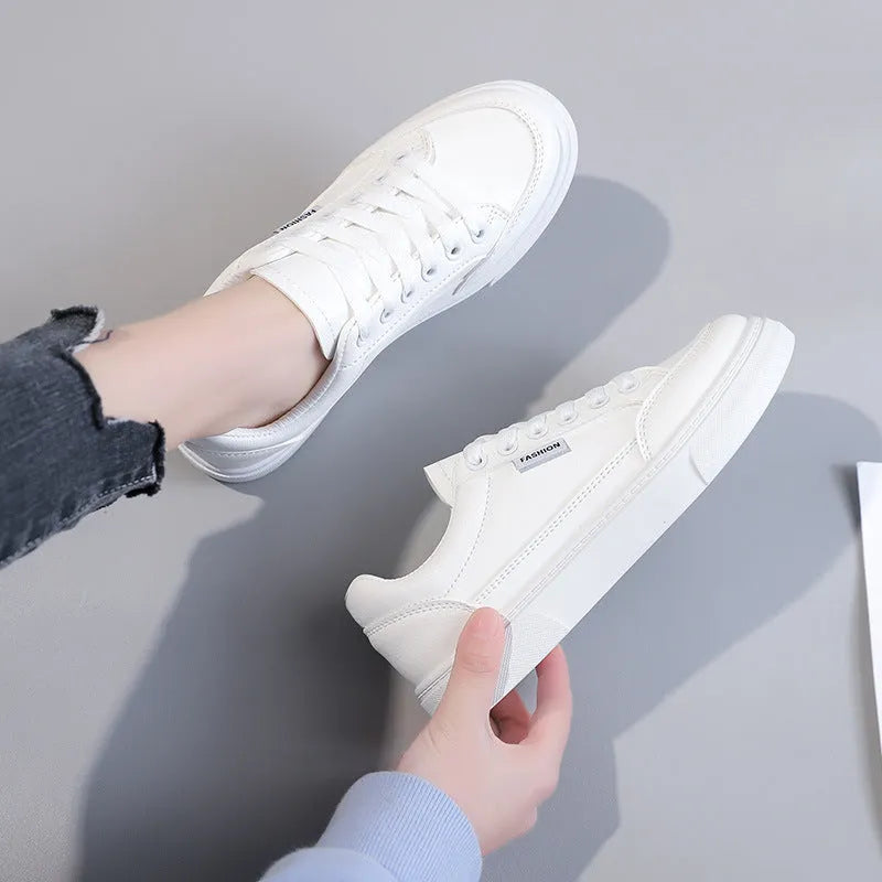 Korean style low-top women's sneakers in white or brown with artificial PU upper and plastic sole