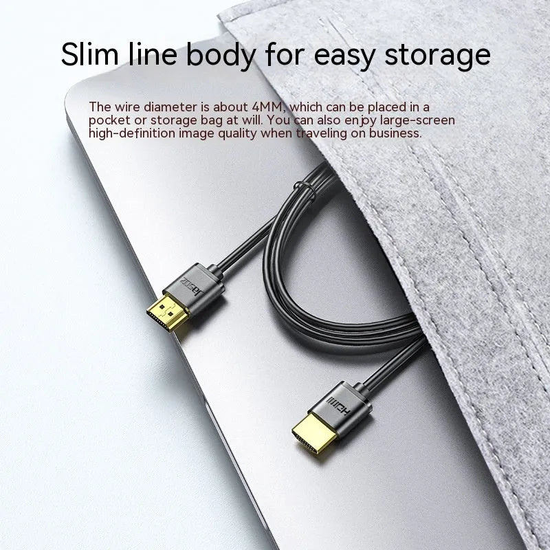 Gold-plated HDMI computer connection cable with thin, flexible black cord.