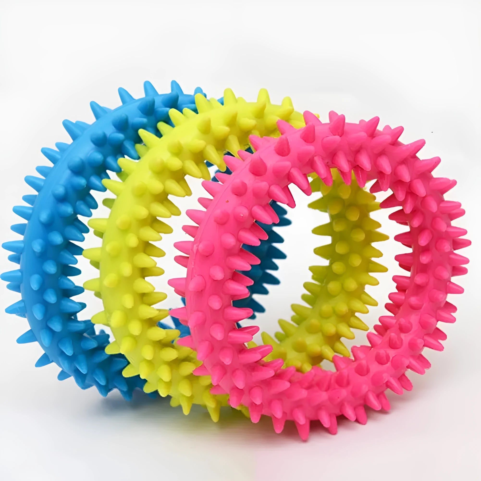 Blue TPR spiky circle dog chew toy for dental cleaning on a white background.
