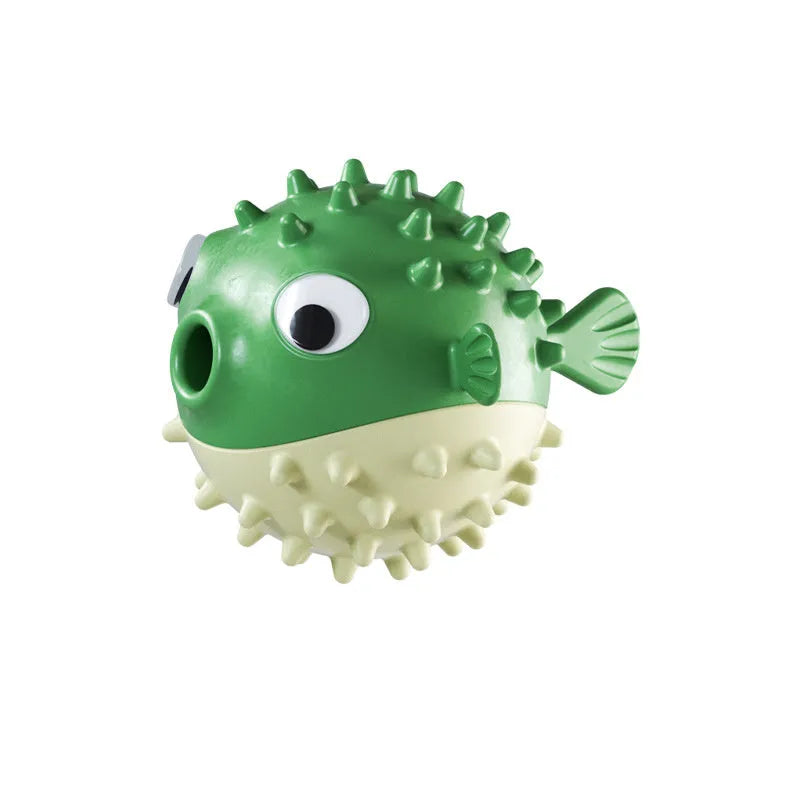 Green fish-shaped dog chew toy with raised surface particles for medium and large breed dogs