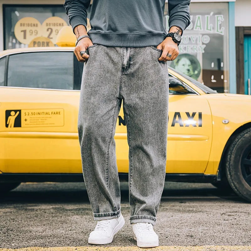 Men's loose straight casual jeans in dark blue, light blue and grey colours with mid waist design