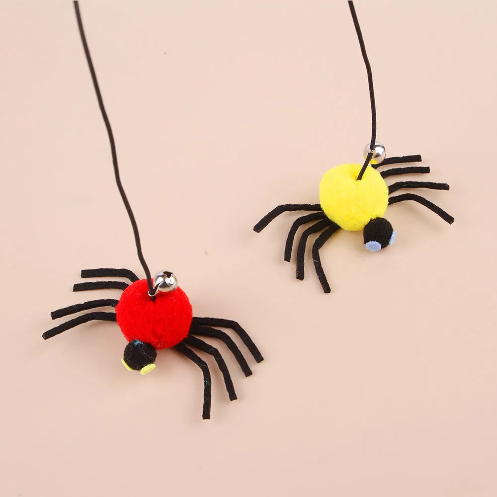 Cat hanging door toy with elastic rope, feather, bell and spider attachment in red colour