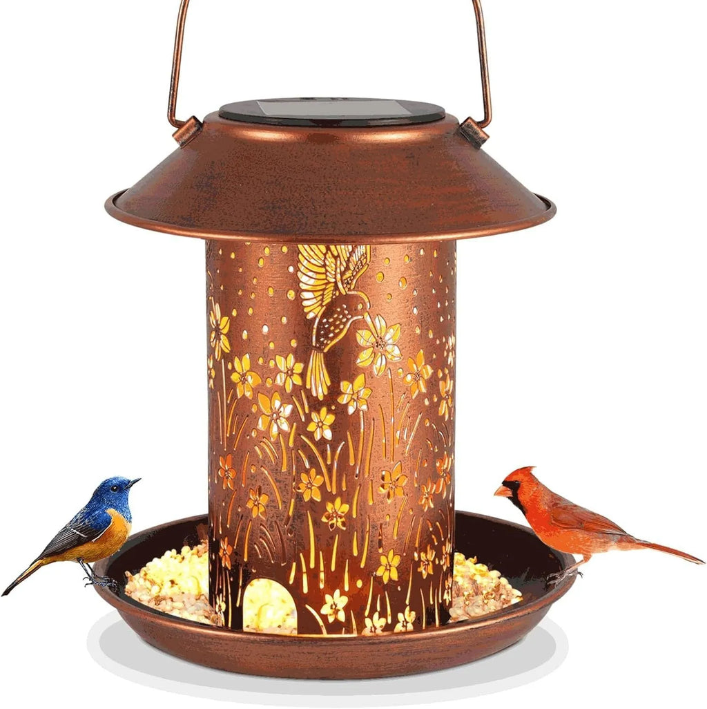 Solar-powered hummingbird-shaped bird feeder with integrated LED lighting for outdoor garden use