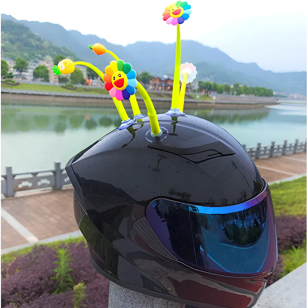 Yellow silicone sunflower decoration with a suction cup mount for helmets