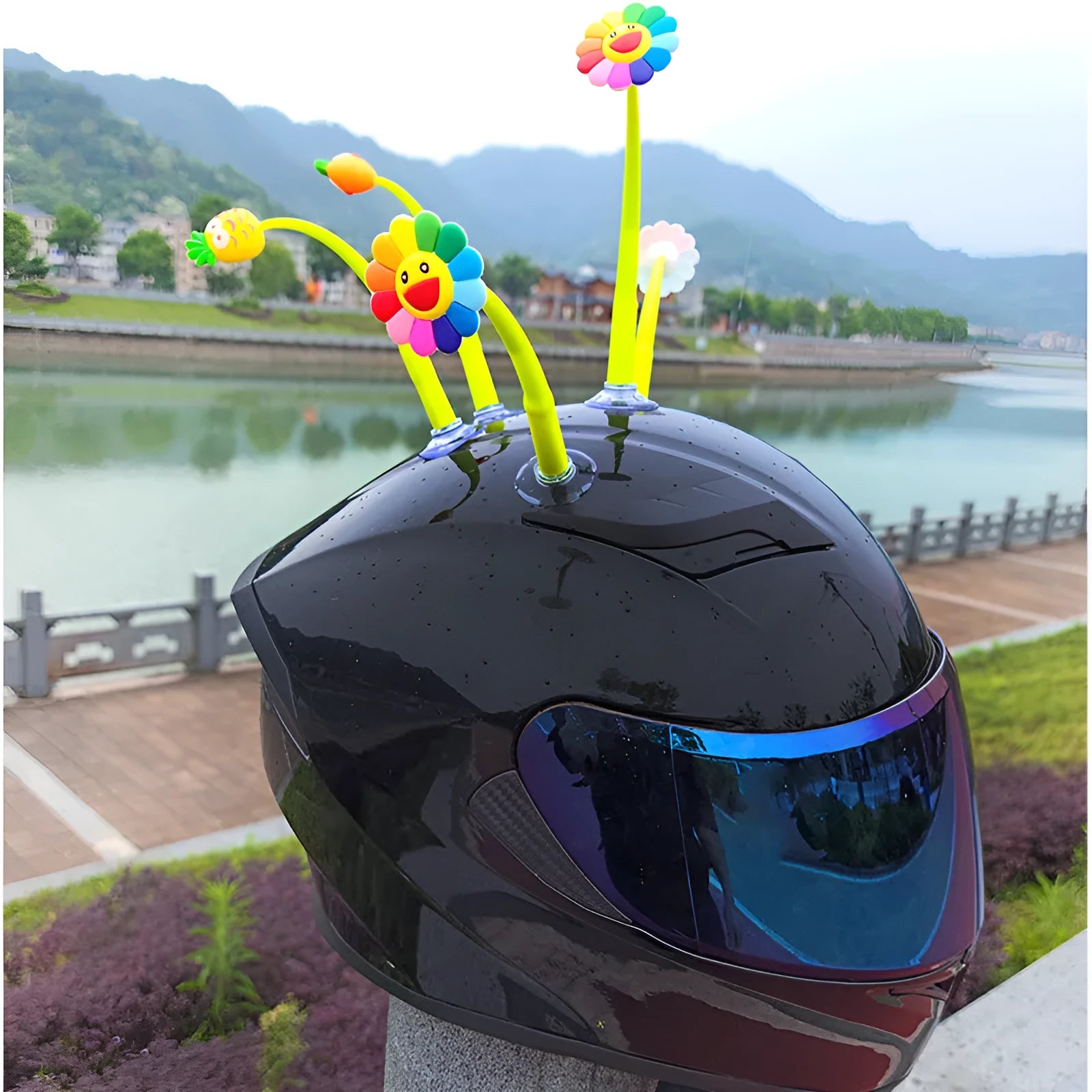 Yellow silicone sunflower decoration with a suction cup mount for helmets