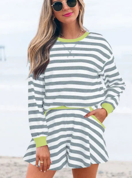 Women's black stripe cotton blouse and matching shorts set with ribbed banding detail.
