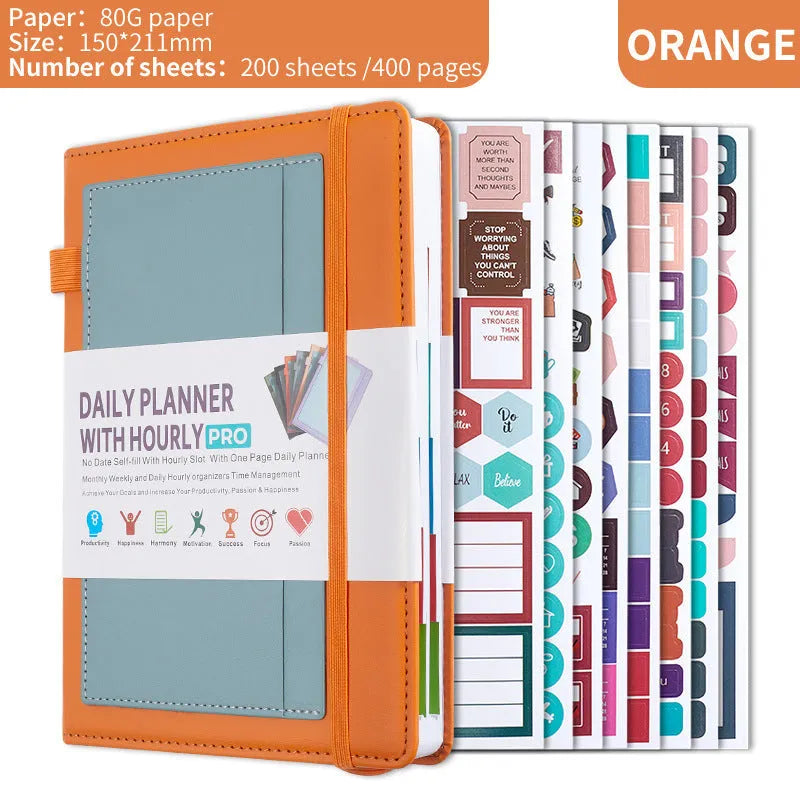 A5 notebook with purple PU cover closed by a black elastic strap