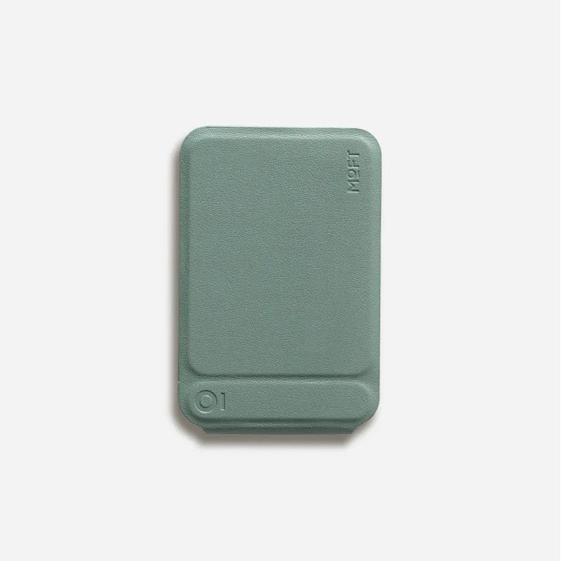 Black magnetic mobile phone case with integrated kickstand deployed, showing slim profile and leather finish.