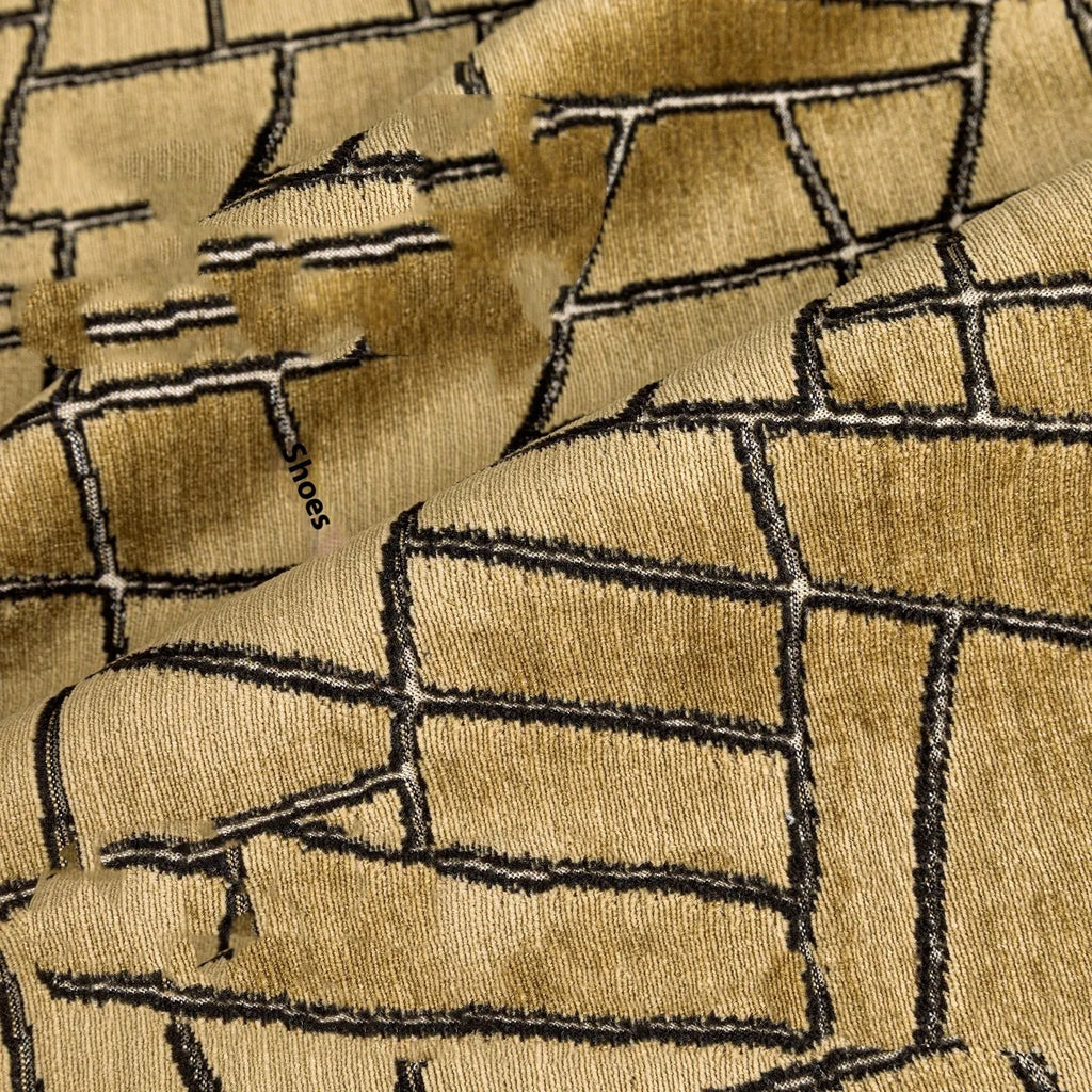 Tuhao Gold geometric abstract pillow cover in feather velvet texture on sofa