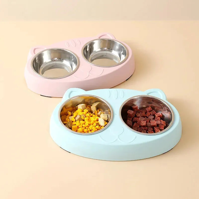 Blue macaron-styled double bowl plastic feeder tray for cats and dogs on a wooden floor.