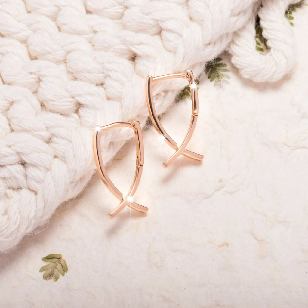 Rose gold cross shaped copper earrings single pair jewellery accessory