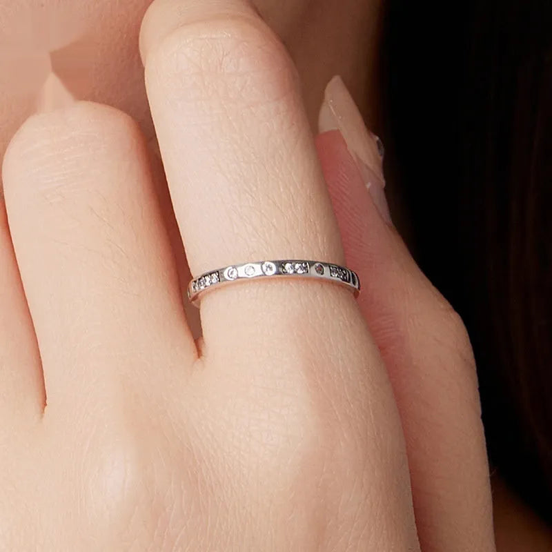 Silver I Love You ring with Moss Password engraving and oxidised black finish.