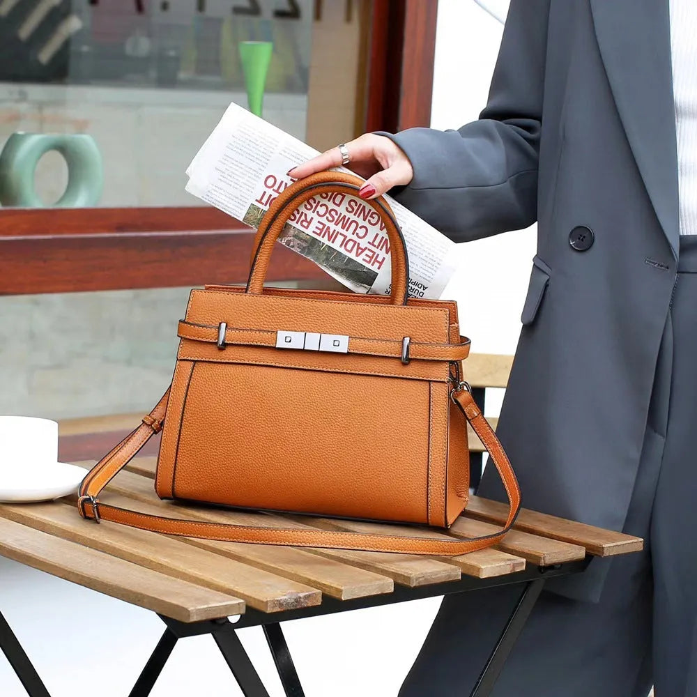 Small square genuine leather shoulder bag in horizontal design with multiple internal pockets