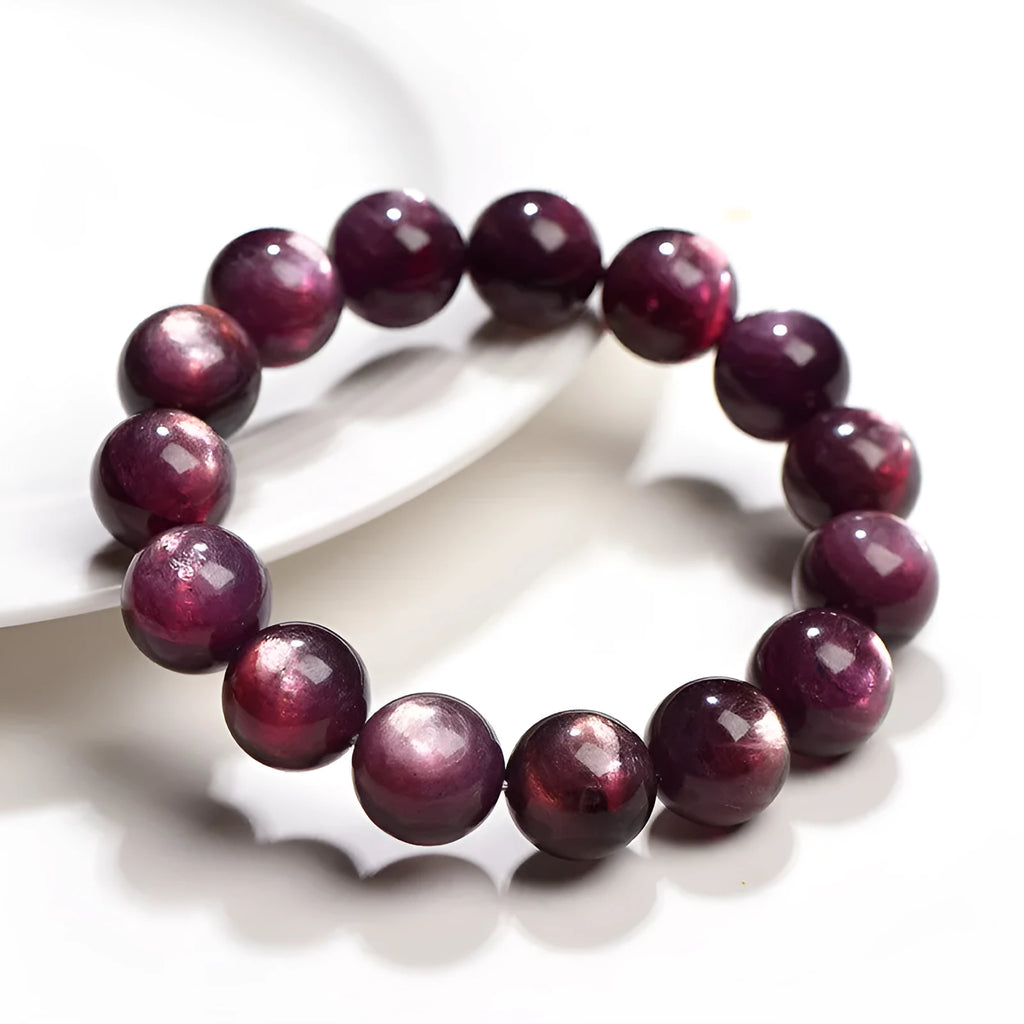 Natural purple lepidolite crystal round beads bracelet with geometric shapes and polished surfaces