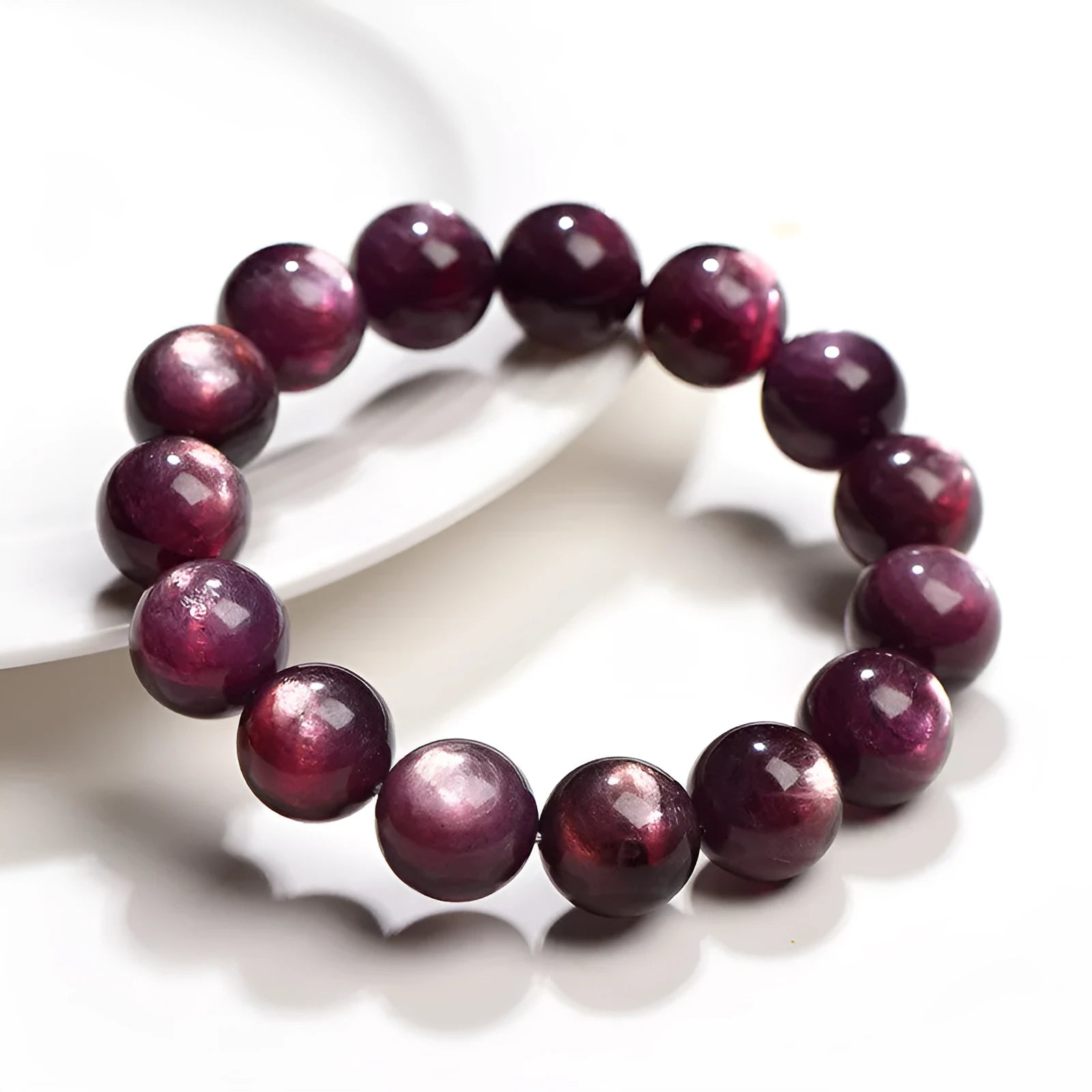 Natural purple lepidolite crystal round beads bracelet with geometric shapes and polished surfaces