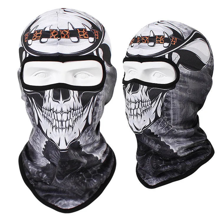 Breathable Bakool silk motorcycle skull mask in a graphic design, laid flat showing its 36cm by 29cm size.