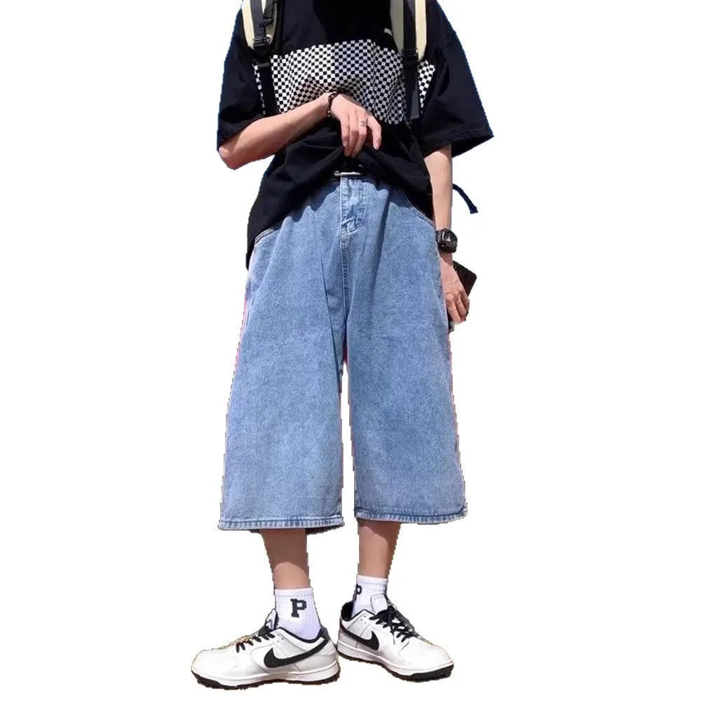 Men's blue washed denim cropped pirate shorts with a high waist and straight legs.