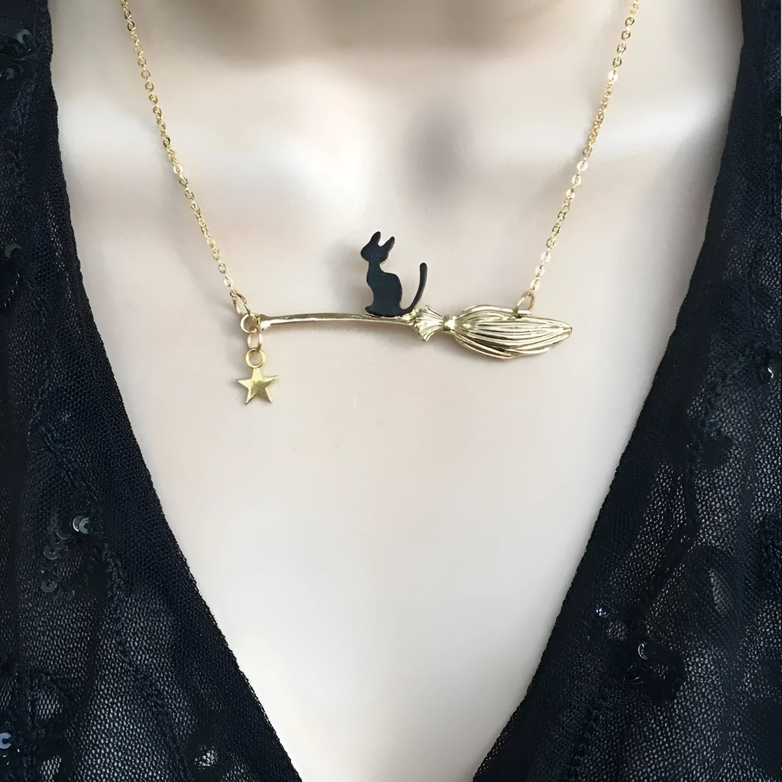 Alloy necklace with a simple black cat pendant for Halloween, shown in silver and gold colour options.