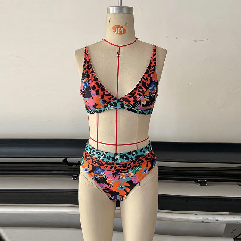 Women's floral print high-waist bikini swimsuit set on a white background.