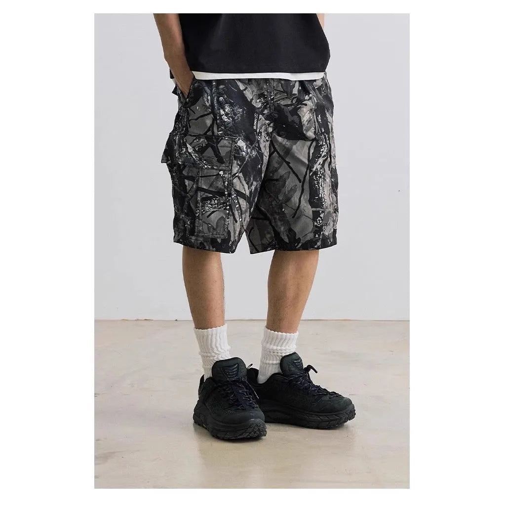 Loose fit denim shorts in army green with a straight leg and elastic waistband.