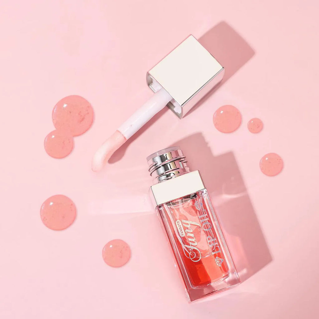 Five shades of moisturising lip gloss mint lipstick with included lip essence oil.