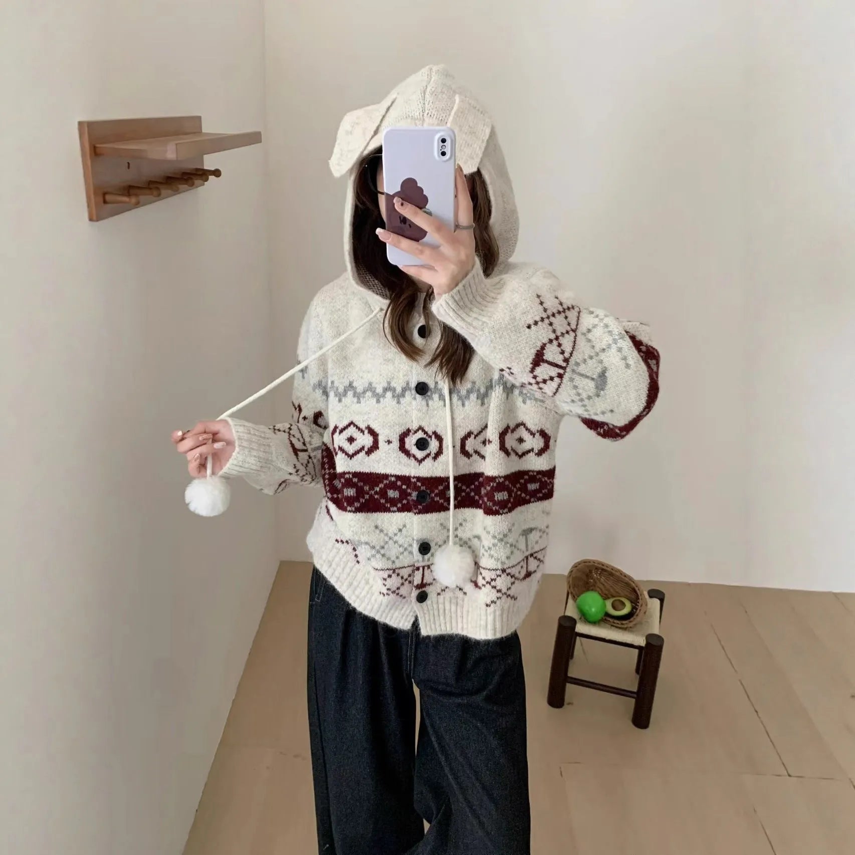 Geometric pattern brocade sweater coat in milky white colour with loose fit free size design