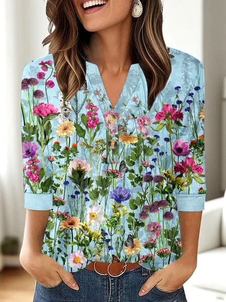 Women's casual V-neck t-shirt with 3D printed pattern showing loose-fit Asian sizing