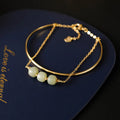 Women's jade bracelet with gold inlay detailing showing single, double and three bead versions