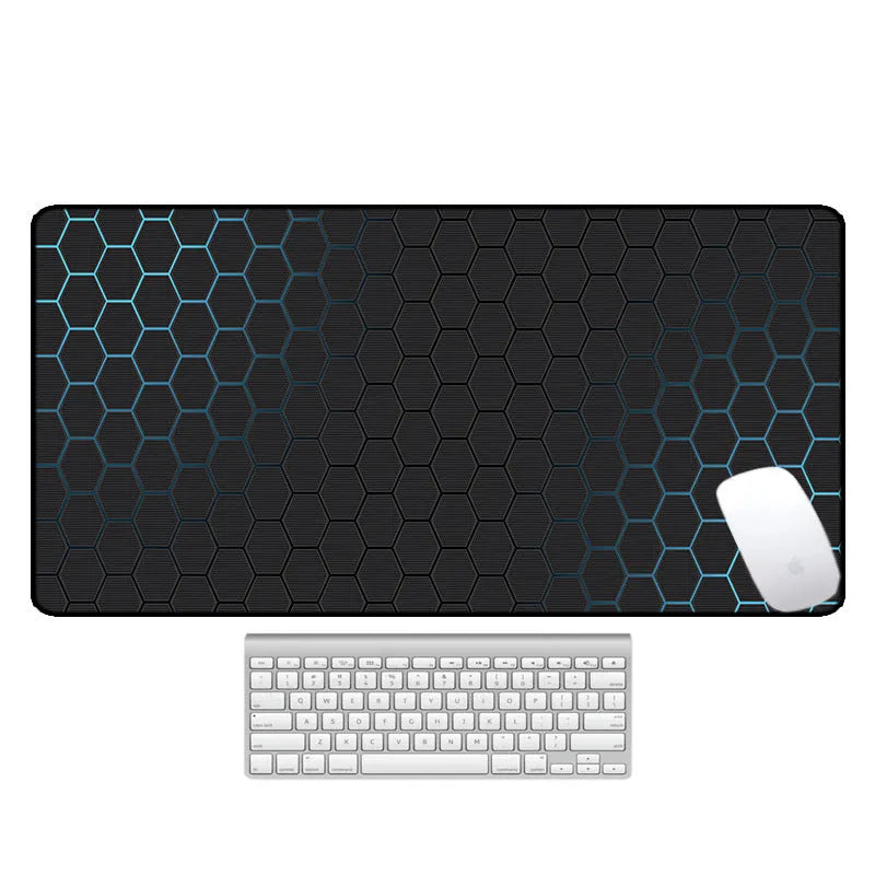Large natural rubber desk mouse pad with a printed geometric pattern, showing non-slip base.
