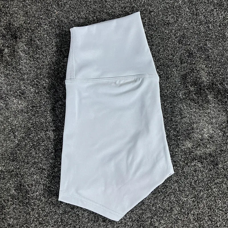 Women's high-waisted nylon yoga shorts in various colours suitable for running, sports, and cycling