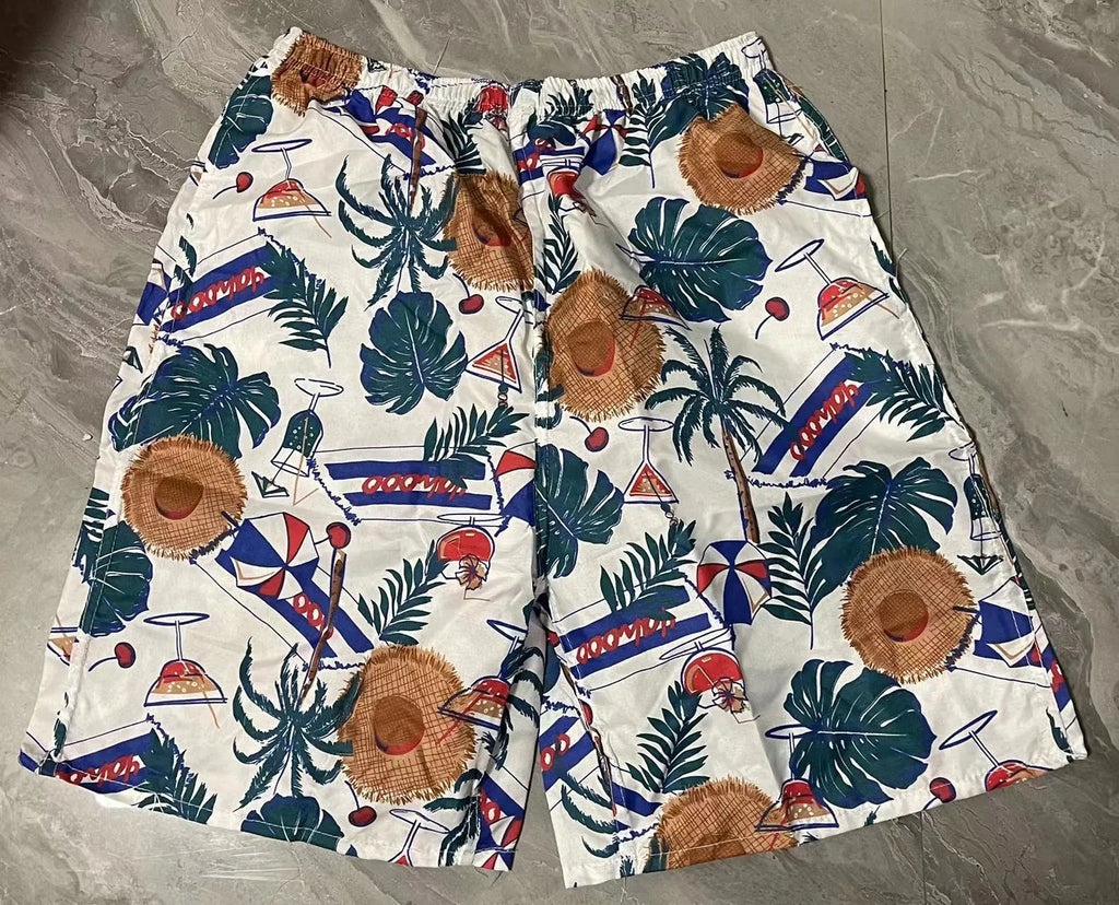 Men's floral print swimming trunks in multiple colour variations for pool and beach wear