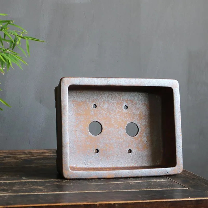 Purple sand rectangular bonsai flowerpot with firewood burning finish shown in two size options
