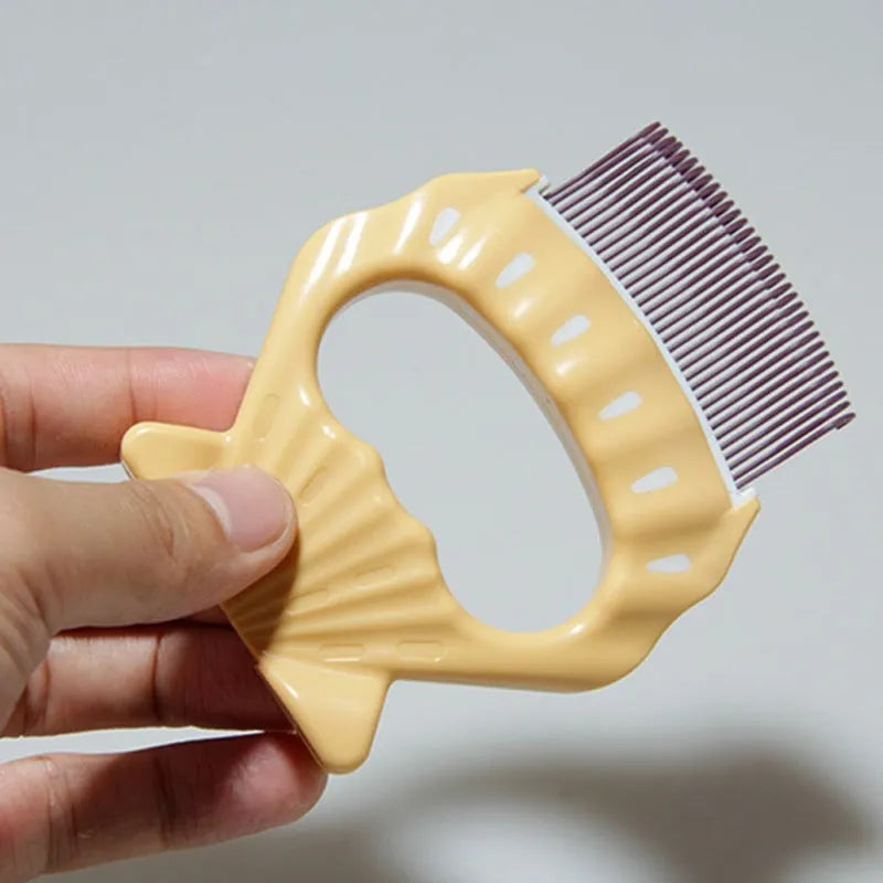 Green shell shaped plastic pet brush with bent wire bristles and an anti-slip handle