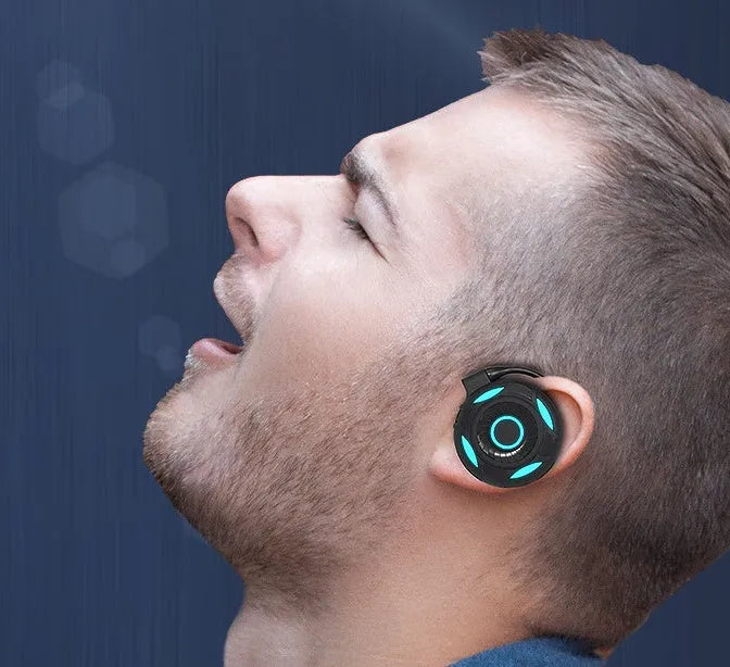 Black and white Bluetooth earphones with hanging ear design for gaming with 10-metre wireless range
