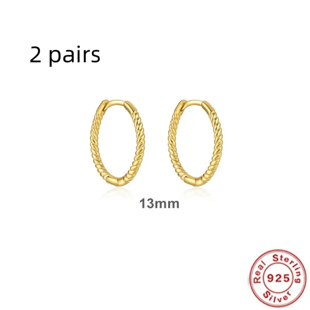 Sterling silver twisted ring earrings in geometric round design with gold or platinum finish