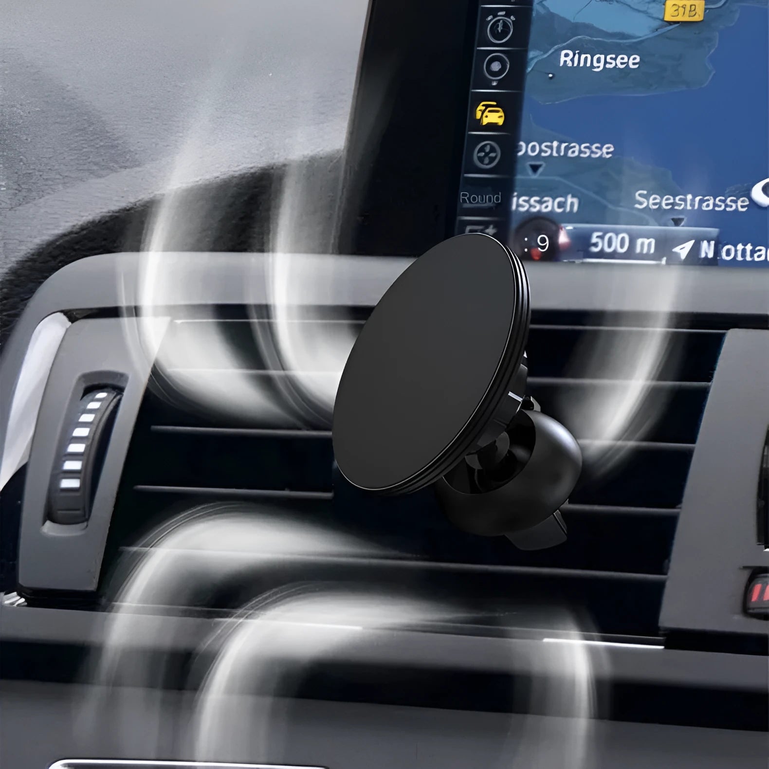 Black aluminium alloy magnetic car phone holder mounted to vehicle air vent