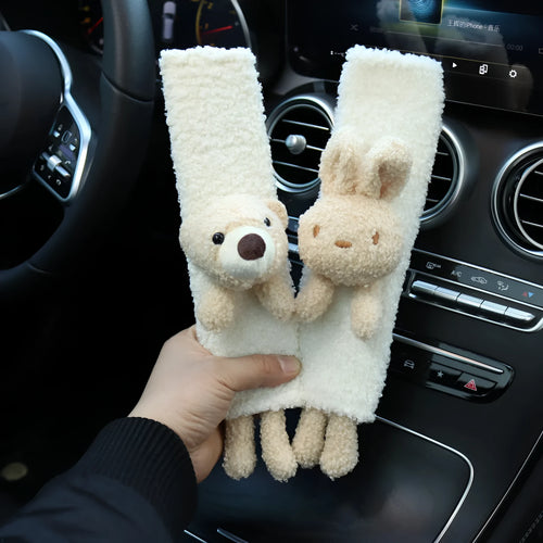 Cartoon plush lamb wool seatbelt shoulder protector in bear and rabbit designs.