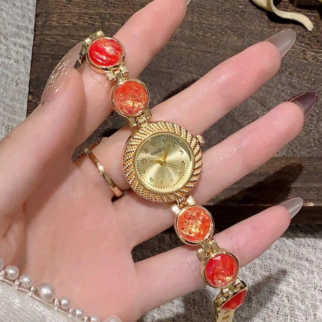 Women's quartz watch with 25mm round dial in choice of six colours on wrist.
