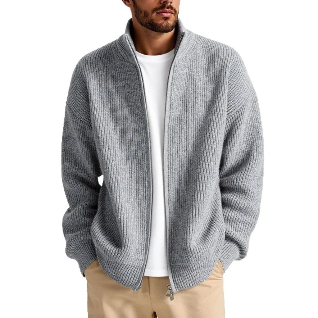 Man wearing a loose grey men's cardigan sweater coat for casual leisure wear