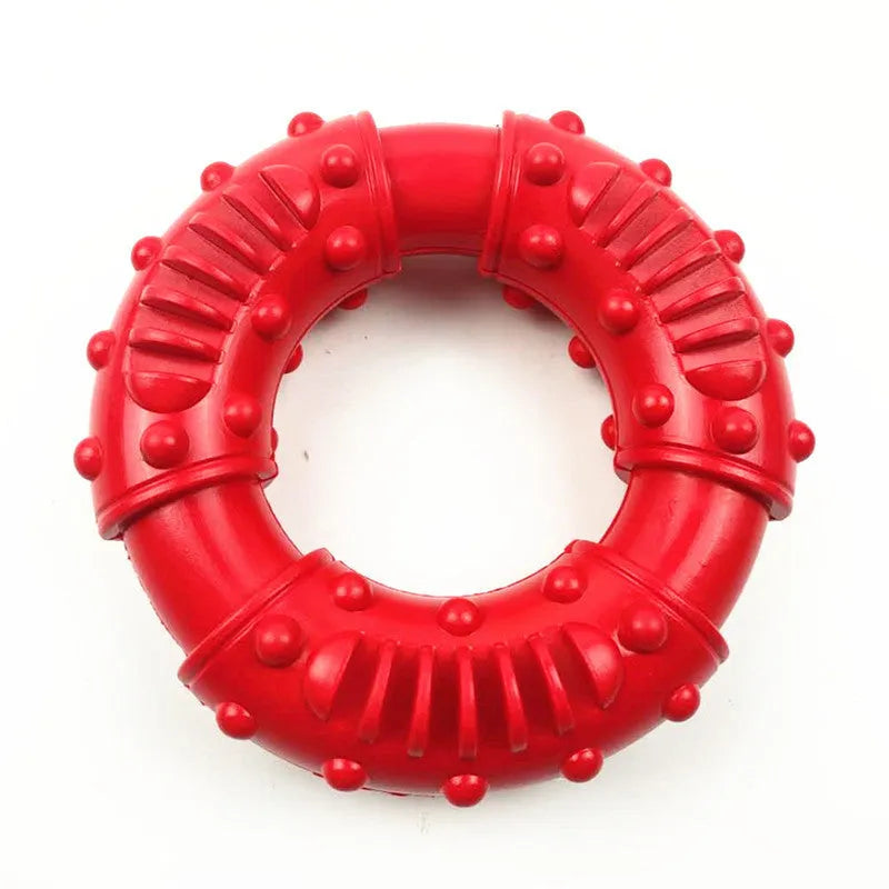 Blue hollow dog fetch stick toy on grass, showing lightweight, chewable design for outdoor play.
