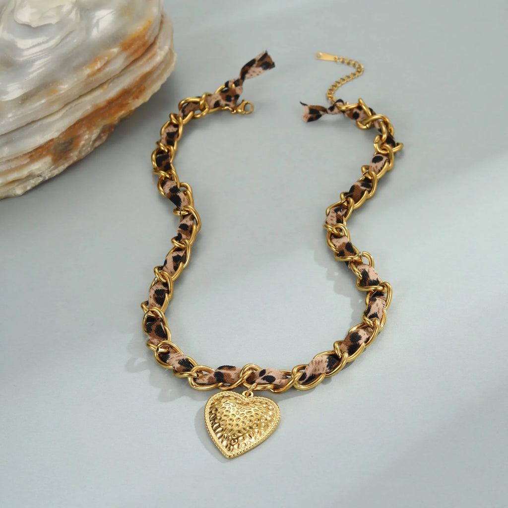 Stainless steel geometric leopard love pendant necklace on adjustable 41-50cm chain with 18K electroplated finish