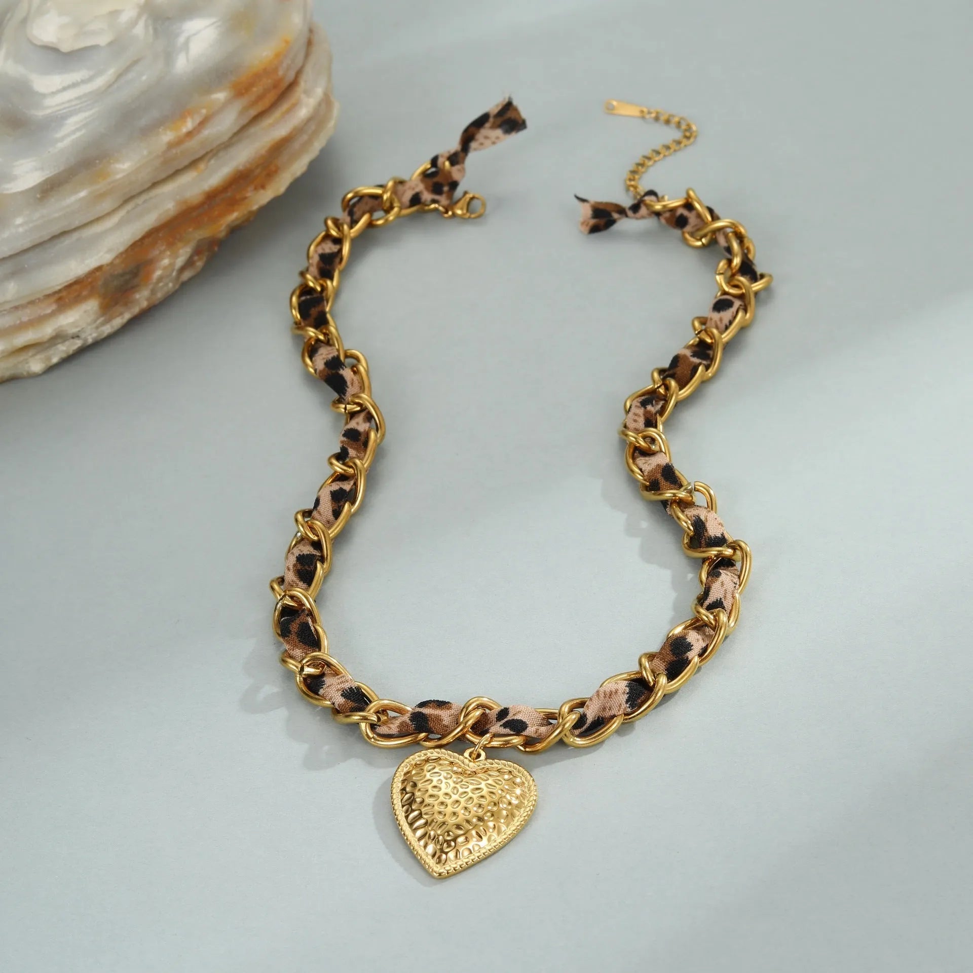 Stainless steel geometric leopard love pendant necklace on adjustable 41-50cm chain with 18K electroplated finish