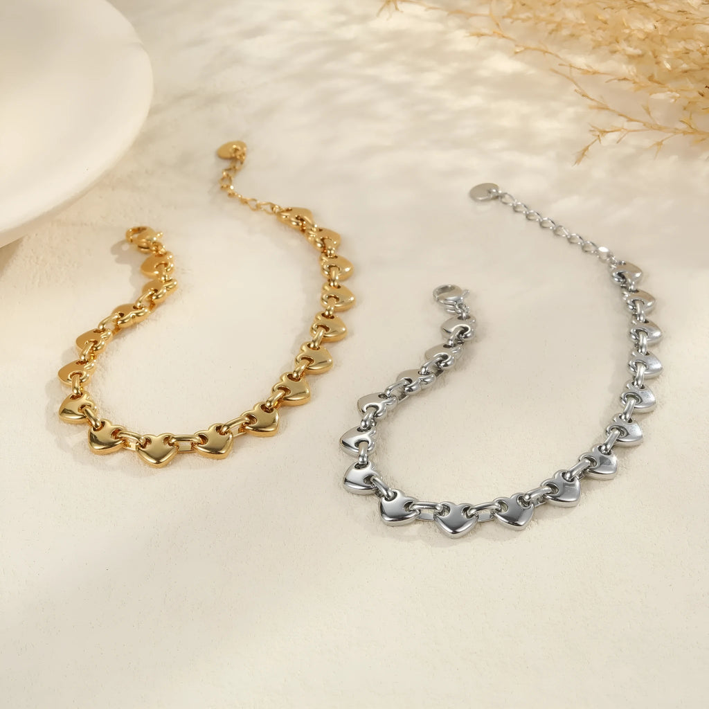 Stainless steel hollowed-out heart bracelet with electroplated 18K finish